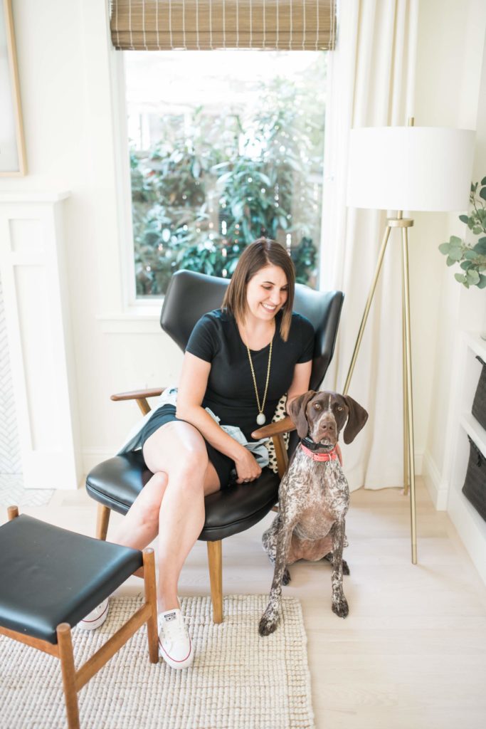 Krissy Peterson at home with her dog