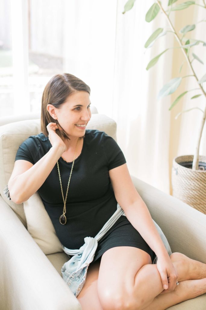 Krissy Peterson sitting in her living room