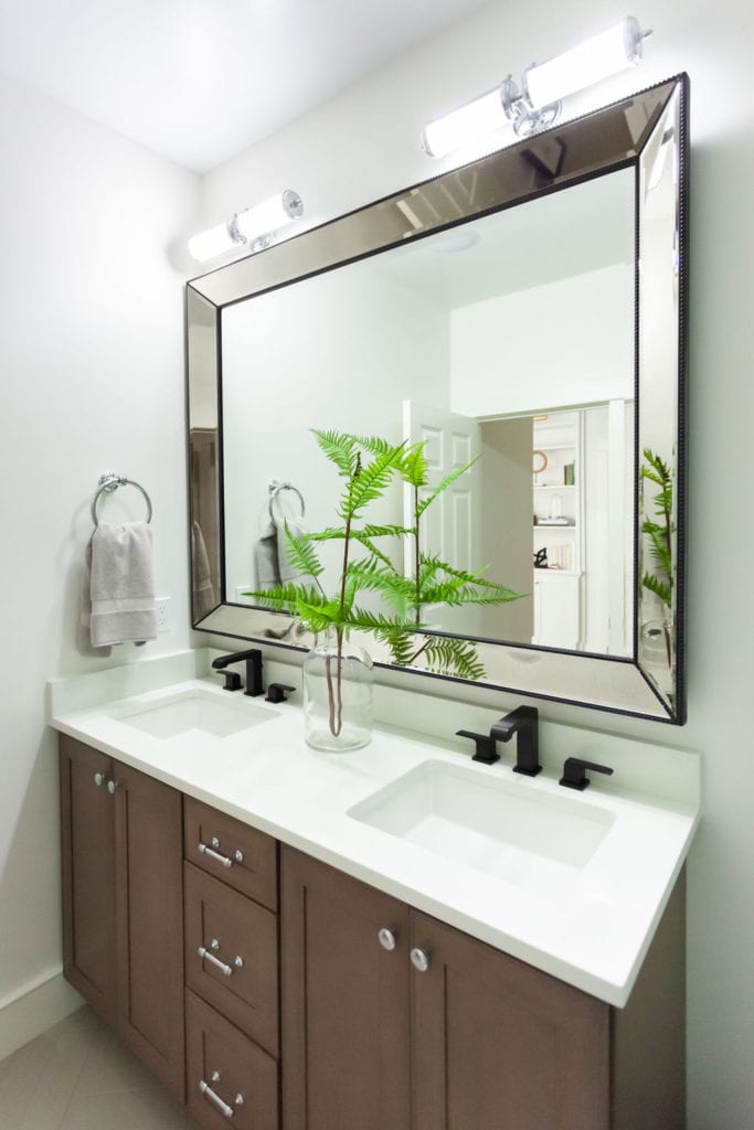 Large framed brass modern guest bathroom mirror