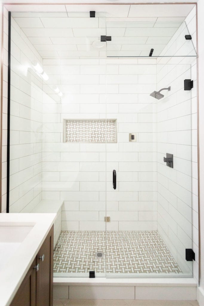 Modern guest bathroom with a basketweave mosaic tile